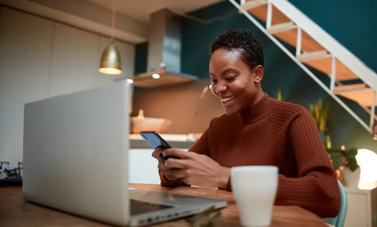 photo of woman using ServiceNow custom application on mobile phone