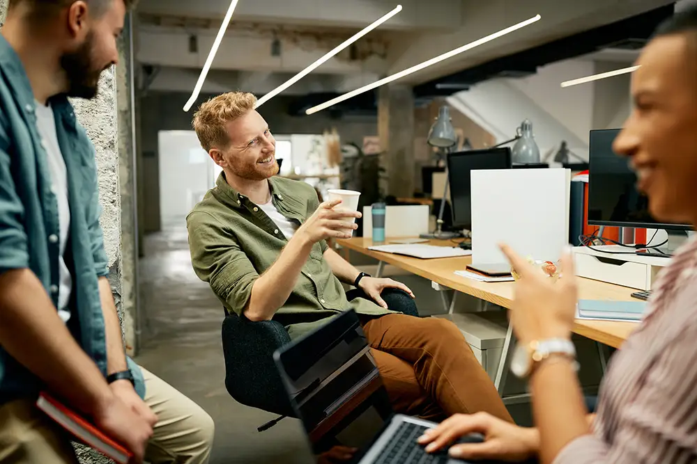 Business team enjoying a lively break conversation.